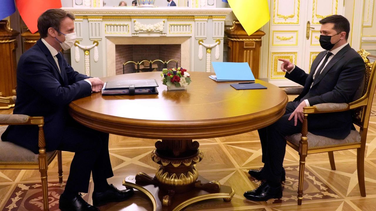 Ukrainian President Volodymyr Zelenskyy (right) meets with  Emmanuel Macron in February in Kyiv. The French President has  said he believes negotiations will need to take place between Russia and Ukraine.