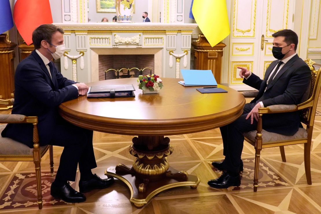 Ukrainian President Volodymyr Zelenskyy (right) meets with Emmanuel Macron in February in Kyiv. The French President has said he believes negotiations will need to take place between Russia and Ukraine.