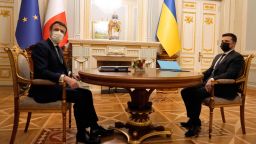 Ukrainian President Volodymyr Zelenskyy (R) meets with French President Emmanuel Macron on February 8, 2022 in Kyiv, Ukraine. - Macron said he had convinced Russian President not to escalate the crisis around Ukraine, ahead of talks in Kyiv aimed at defusing fears Moscow could invade. (Photo by Thibault Camus / POOL / AFP) (Photo by THIBAULT CAMUS/POOL/AFP via Getty Images)