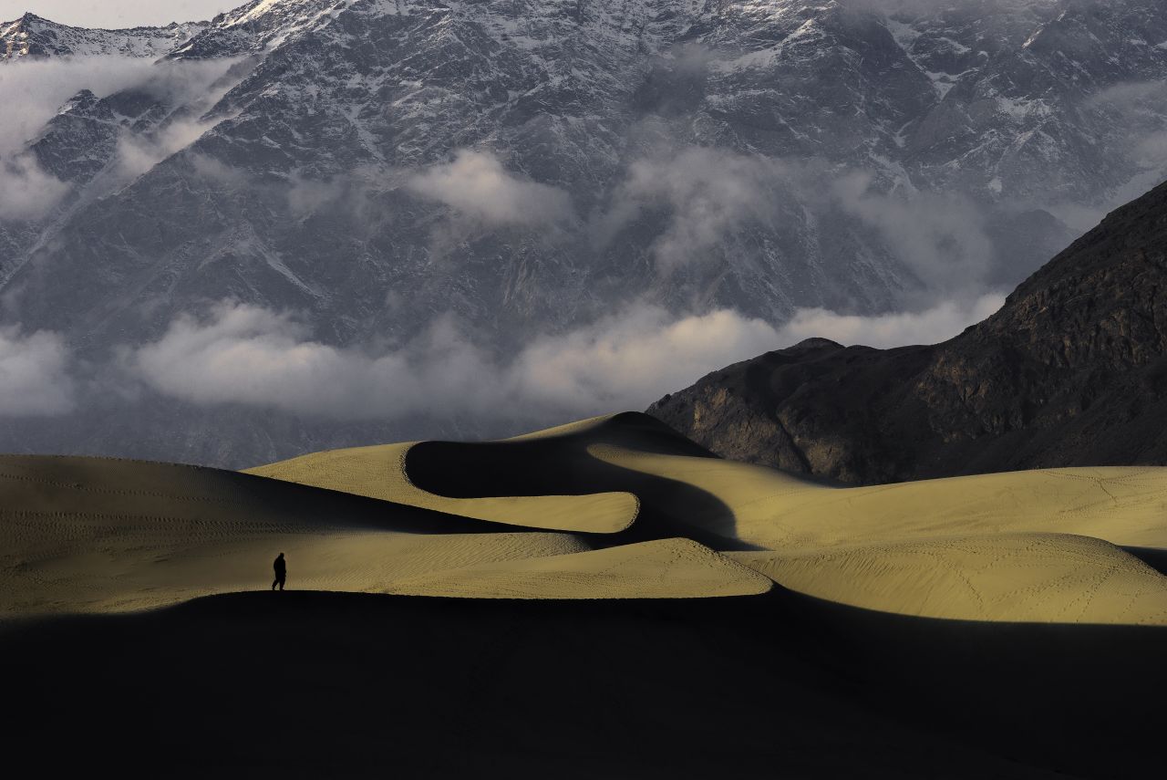 Yawar Abbas' photo "Golden Snake" captures the golden sunset at the cold desert in Skardu, Pakistan.