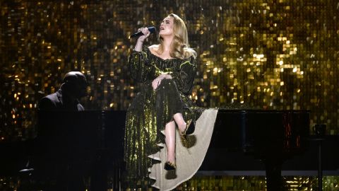 Adele performing onstage during The BRIT Awards.