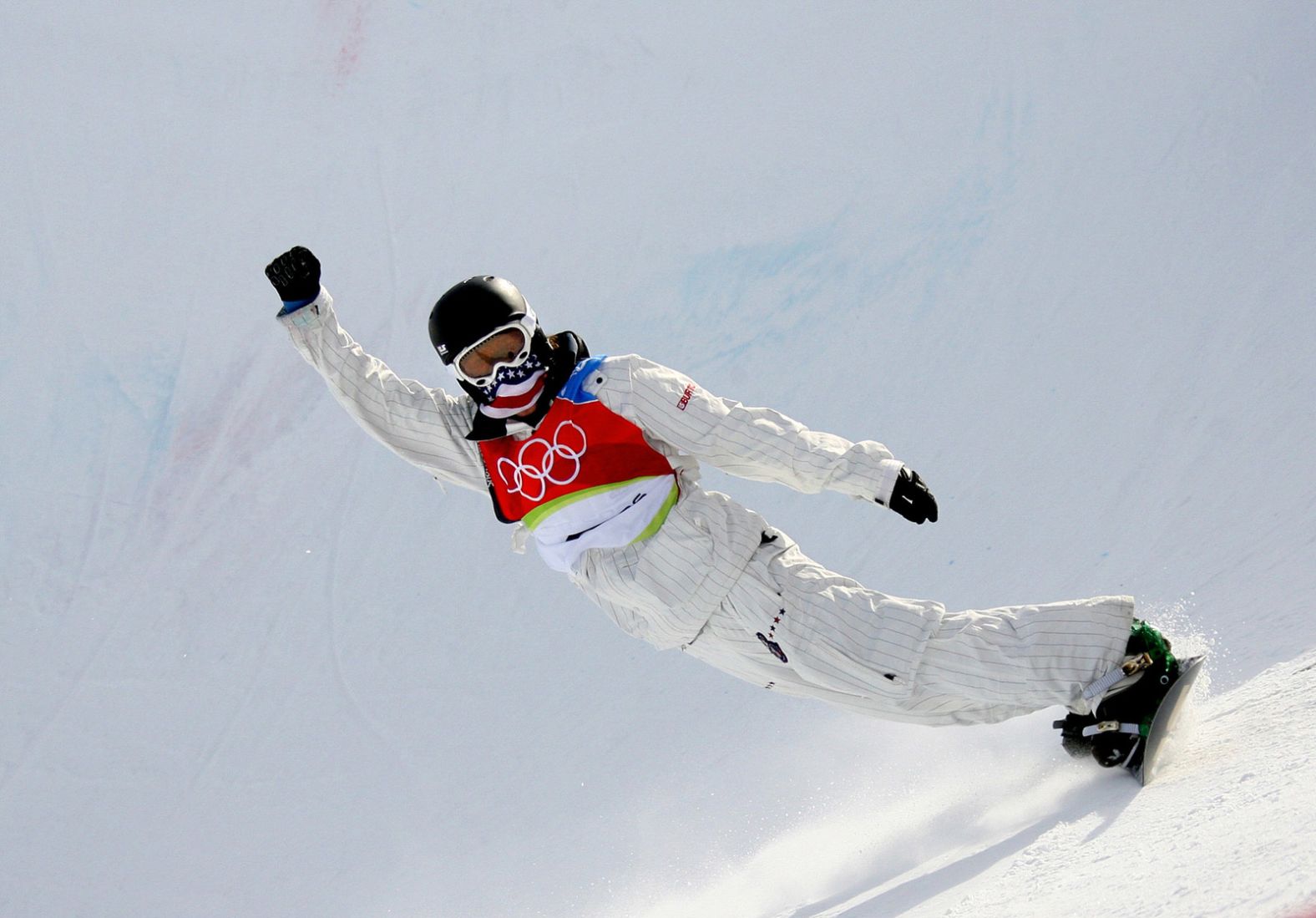 White celebrates after winning the halfpipe event at the 2006 Winter Olympics in Italy. It was his first Olympic gold.