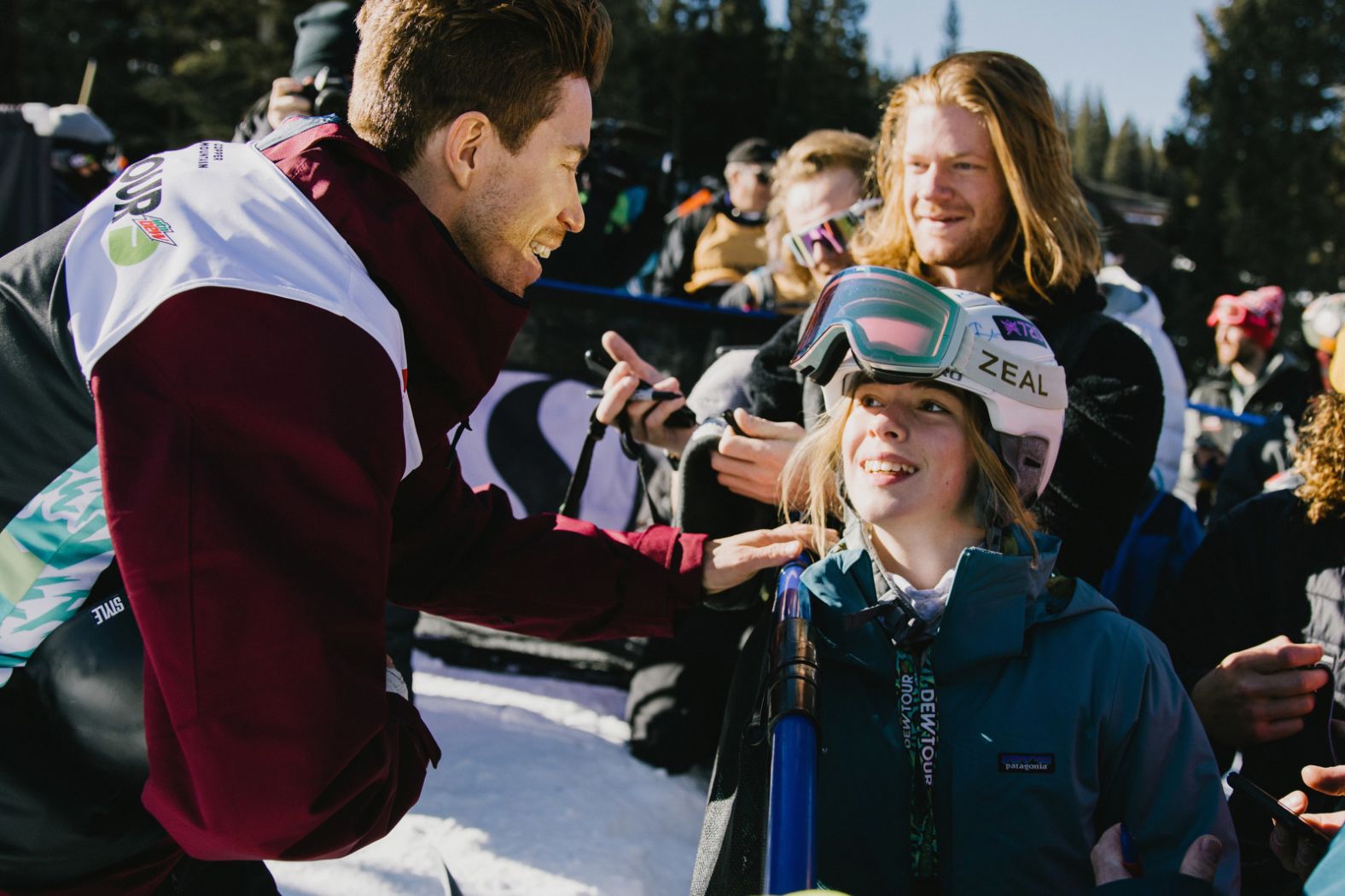 White greets a fan after his final halfpipe run in a Dew Tour event in 2021.