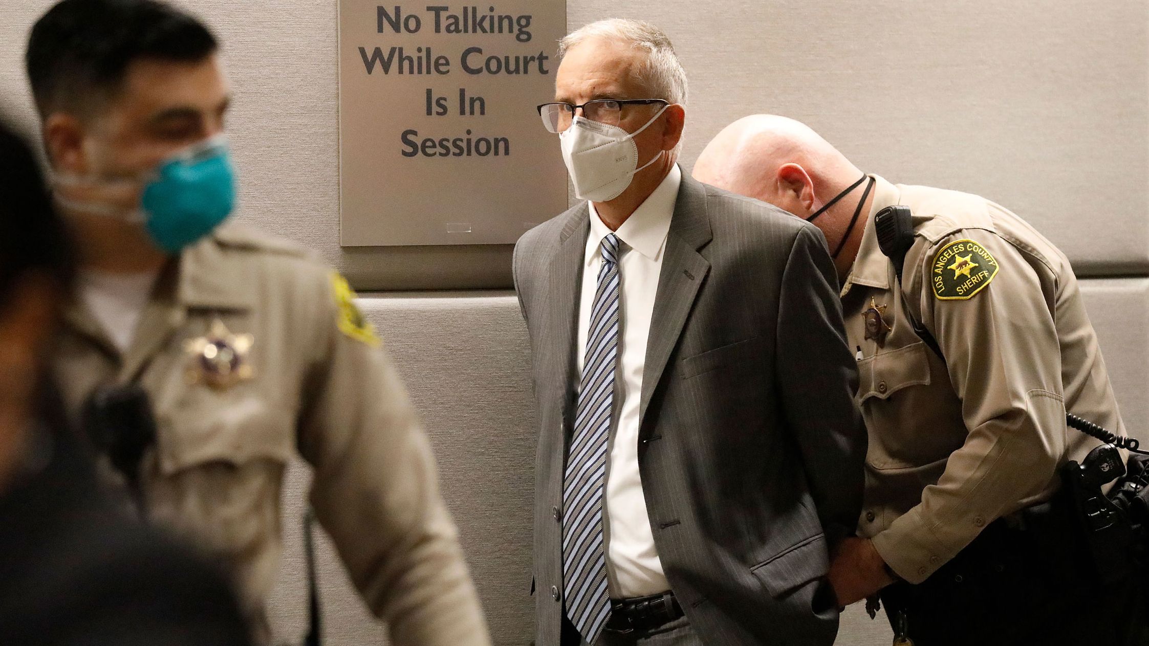 Former UCLA Gynecologist Dr. James Heaps is taken into custody as he appears in Los Angeles Superior Court on August 3, 2020 in Los Angeles.