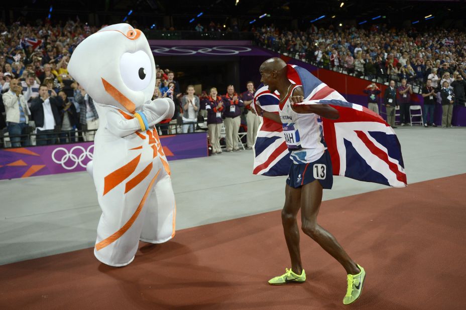 Two one-eyed aliens were created for the 2012 London Olympics. Here, Mo Farah celebrates with one of the mascots, called Wenlock.