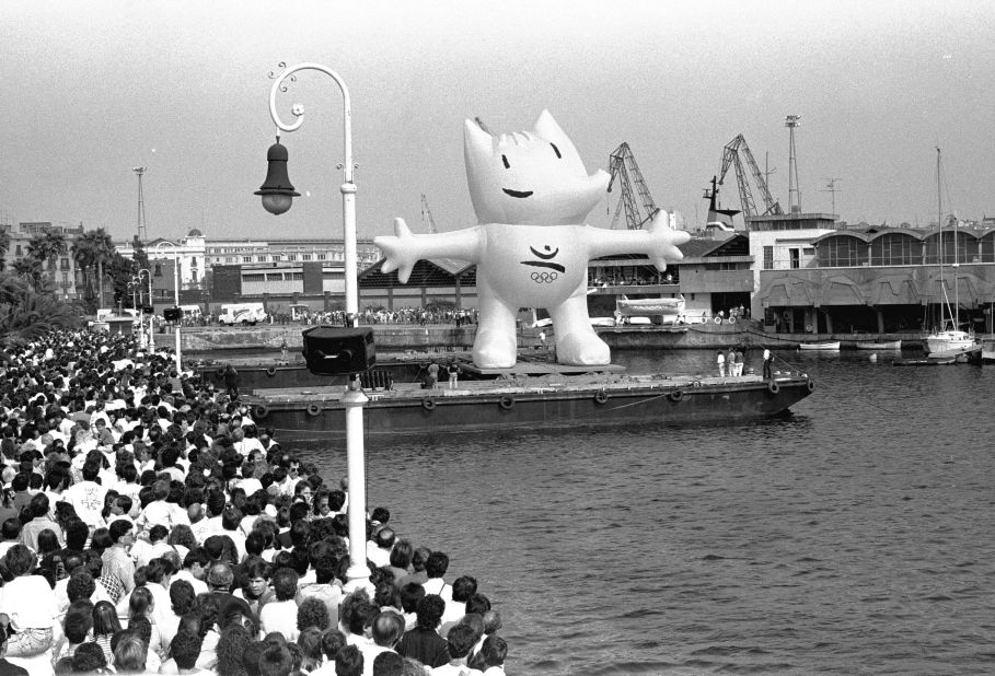 Cobi, official mascot of the 1992 Summer Olympic Games in Barcelona, comes up to the surface in Barcelona's Port to celebrate the arrival of the Olympic Flag.