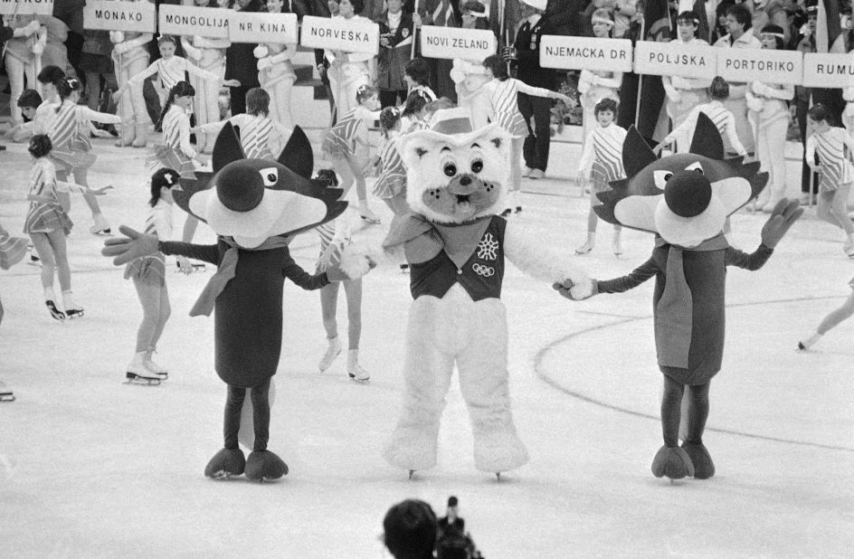 Vucko the wolf, the symbol for the 1984 Winter Olympic Games in Sarajevo's Yugoslavia, dances with Howdy the bear, who went on to represent the Games in Calgary,  Alberta, Canada in 1988.