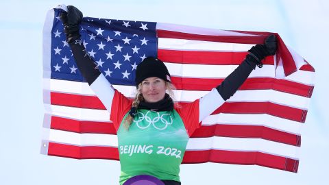 Gold medalist Lindsey Jacobellis poses after winning the women's snowboard cross at the Beijing 2022 Winter Olympic Games.