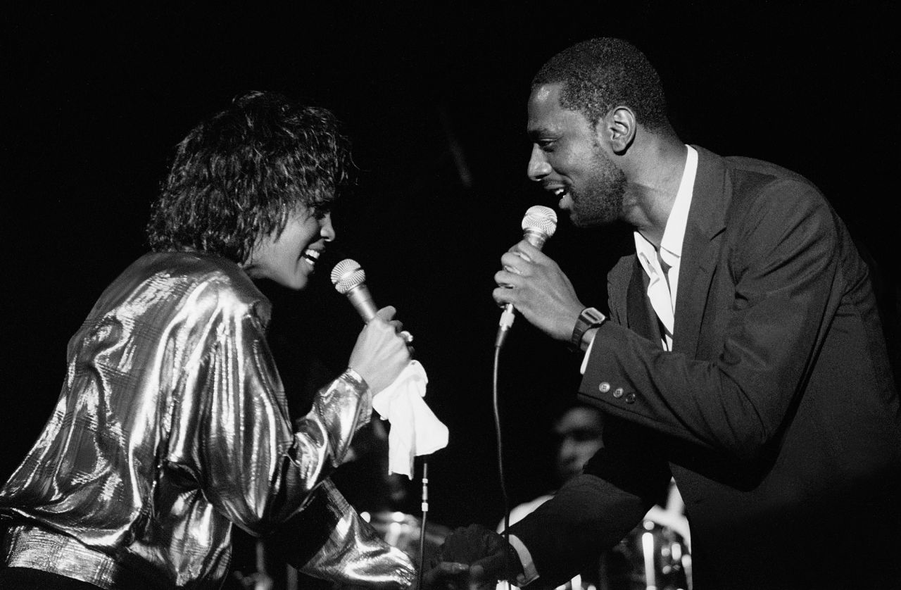 Whitney Houston performs with her half-brother, Gary Garland-Houston, at the Park West in Chicago, Illinois, on May 29, 1985.