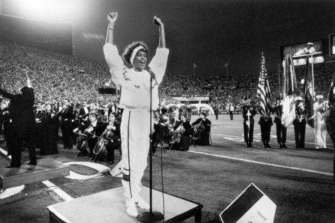 Whitney Houston sings the national anthem prior to Super Bowl XXV at Tampa Stadium in Florida on January 27, 1991.