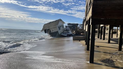 The home collapsed onto the beach in Rodanthe, North Carolina.