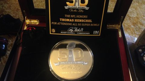 The commemorative Super Bowl 50 coin Tom Henschel recieved in 2016. 