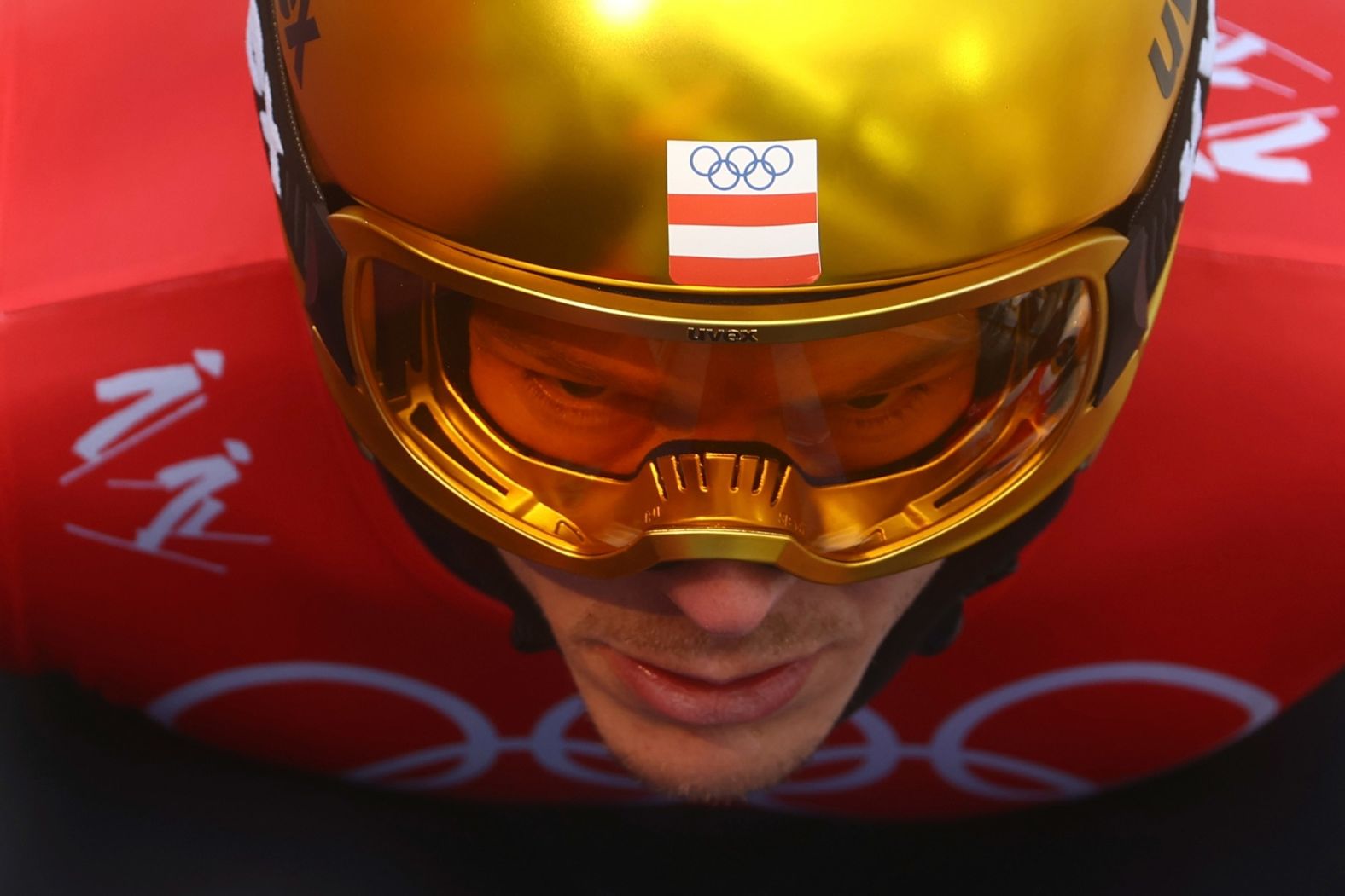 Austria's Franz-Josef Rehrl prepares for a ski jump as he competes in a Nordic combined event on February 9.