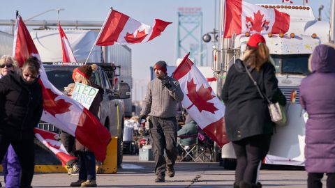 Protestors against Covid-19 vaccine mandates block the roadway at the Ambassador Bridge border crossing in Windsor, Ontario, on February 9, 2022.