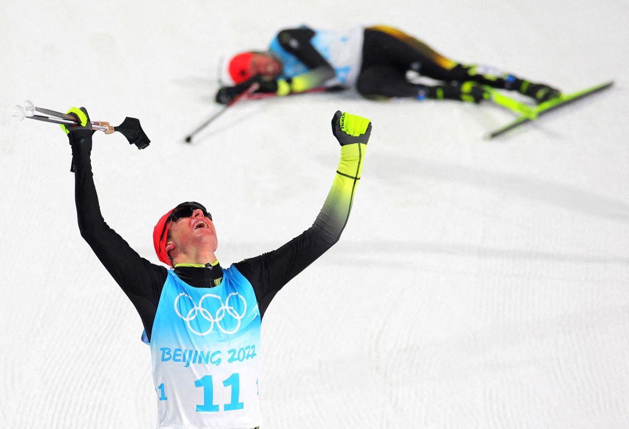 Germany's Vinzenz Geiger celebrates after winning gold in a Nordic combined event on February 9. He was 11th after the ski jumping portion of the competition, and he started the cross-country race nearly a minute and a half behind the leader. But he rallied to make up the ground and cross the finish line first.