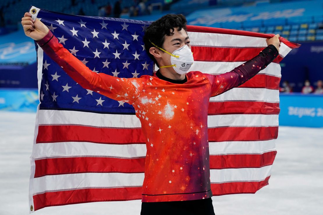 Nathan Chen celebrates after winning the gold medal in the men's free skate program.