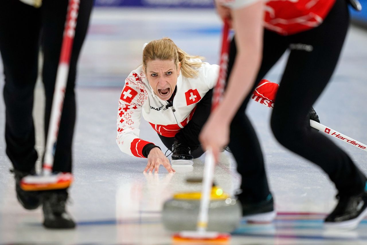 Switzerland's Silvana Tirinzoni yells to her sweepers during a curling match against Great Britain on February 10.