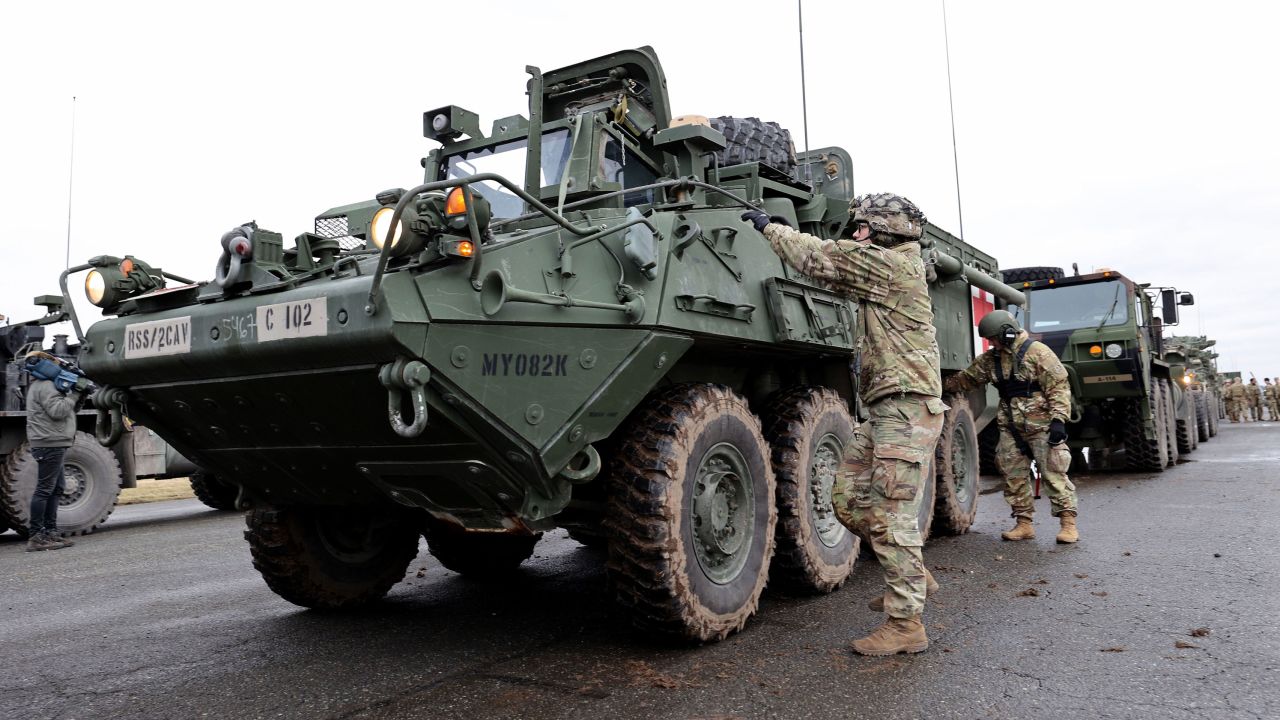 VILSECK, GERMANY - FEBRUARY 09: Soldiers of 2nd Squadron, 2nd Cavalry Regiment of the U.S. Army prepare armoured combat vehicles before deploying to Romania on February 09, 2022 in Vilseck, Germany. The troops will join other US troops already there as part of a coordinated deployment of NATO forces across eastern Europe. The effort is part of NATO's response to the large-scale build up of Russian troops on the border to Ukraine, which has caused international fears of an imminent Russian military invasion. (Photo by Alexandra Beier/Getty Images)