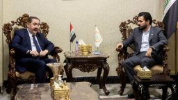 Head of the political body of Iraq's Sadrist bloc Hassan al-Adari (R), meets with Hoshyar Zebari leader of the Kurdish delegation to negotiations on forming the new government after parliamentary elections, in the capital Baghdad, on November 5