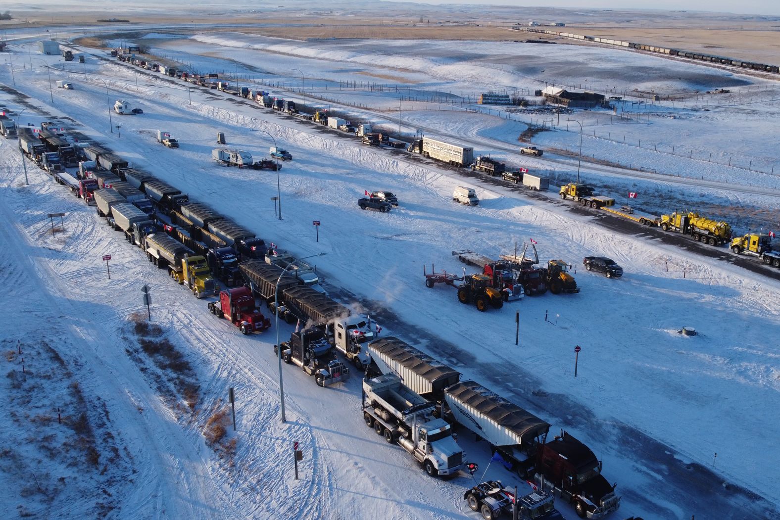 Lines of trucks block the US-Canada border during a demonstration in Coutts, Alberta, on February 2.