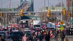 Protestors against Covid-19 vaccine mandates block the roadway at the Ambassador Bridge border crossing in Windsor, Ontario, Canada, on  February 9, 2022. The protestors, who are in support of the Truckers Freedom Convoy in Ottawa, have blocked traffic in the Canada bound lanes of the bridge since Monday evening. Approximately $323 million worth of goods cross the Windsor-Detroit border each day at the Ambassador Bridge, making it North Americas busiest international border crossing. 