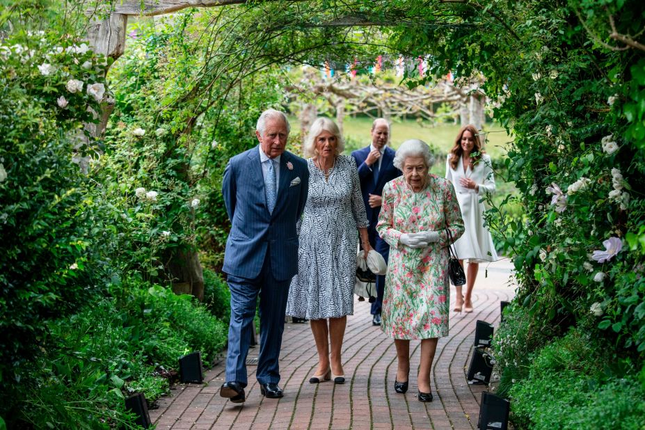 Queen Elizabeth II walks with Charles and Camilla before a reception at the G7 summit in England in June 2021.