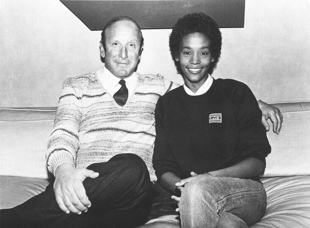 Whitney Houston is seen with the music producer Clive Davis in 1983, shortly after she signed a contract with Arista Records.