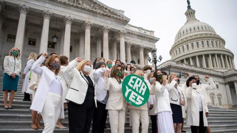 Speaker of the House Nancy Pelosi, joined by other House Democratic women members pose for a photo on the House steps after the House passed a joint resolution to remove the Equal Rights Amendment deadline in Washington on Wednesday, March 17, 2021.