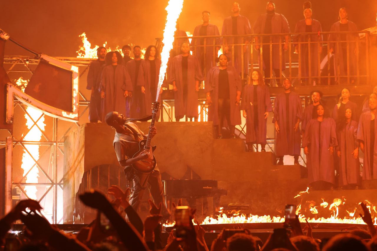 Flames shoot out of the guitar of British rapper Dave as he performs during the BRIT Awards in London on Tuesday, February 8.