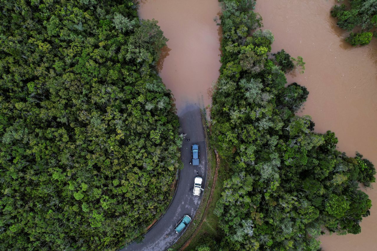 Cars stop before a flooded area in Vohiparara, Madagascar, on Sunday, February 6, after <a href="https://www.cnn.com/2022/02/07/africa/second-cyclone-hits-madagascar-intl/index.html" target="_blank">Cyclone Batsirai made landfall.</a>