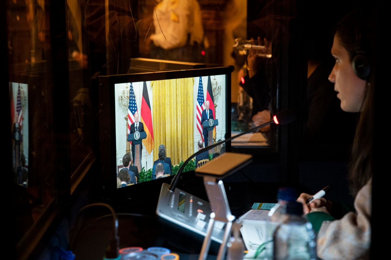 A woman is seen inside a translator booth as US President Joe Biden and German Chancellor Olaf Scholz hold a joint news conference at the White House on Monday, February 7. Biden and Scholz sought to put on a united front, but <a href="https://www.cnn.com/2022/02/07/politics/biden-scholz-meeting-ukraine/index.html" target="_blank">one key sticking point appeared to remain:</a> the future of the Nord Stream 2 gas pipeline.