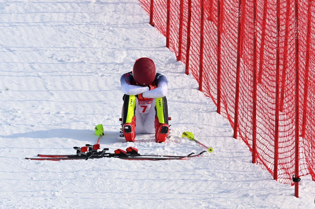 A dejected Mikaela Shiffrin sits on the side of the Olympic slalom course after she <a href="https://www.cnn.com/world/live-news/beijing-winter-olympics-02-09-22-spt/h_49a3673f53f4141b60a6a063dba18c4b" target="_blank">missed a gate on her first run and was disqualified</a> on Wednesday, February 9. The American skier was one of the favorites in the event. Her miscue came two days after <a href="https://www.cnn.com/world/live-news/beijing-winter-olympics-02-07-22-spt/h_c67e815b4abe2381f4ae0467622fa538" target="_blank">a shocking fall in the giant slalom.</a>