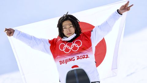 Japan's Ayumu Hirano celebrates after winning gold at the Beijing Games.