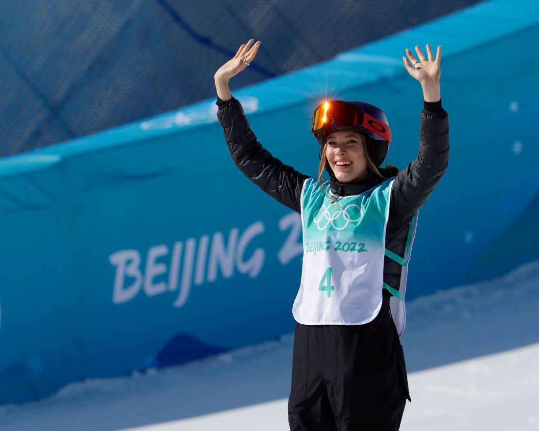 Gold medalist Eileen Gu celebrates on the podium during the freestyle skiing women's big air final during the Beijing 2022 Olympic Winter Games.