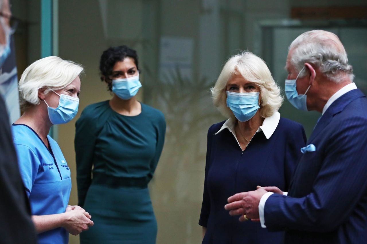 Charles and Camilla speak to Chief Nursing Officer for England Ruth May in March 2021 as they meet with officials involved in the Covid-19 vaccine rollout.