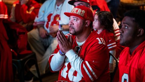 A San Francisco 49ers fan watches his team play against the Kansas City Chiefs during Super Bowl LIV.