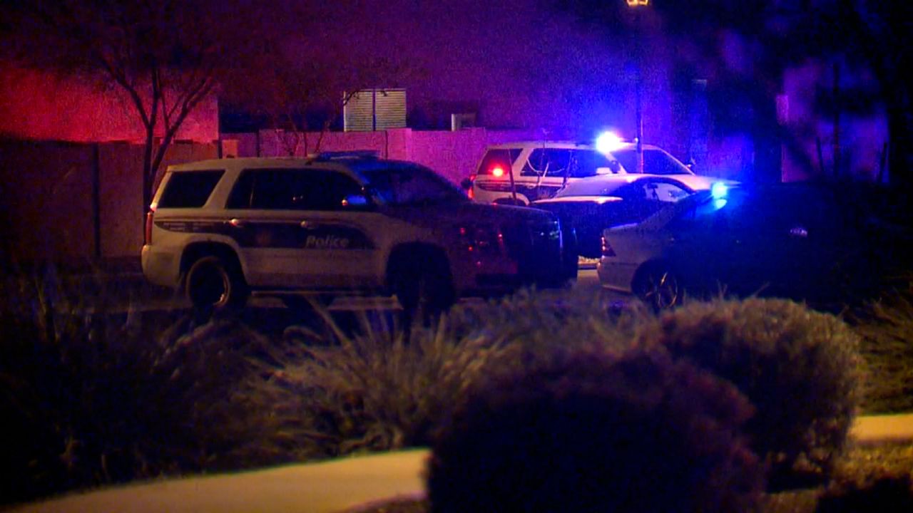 A suspect inside the suburban Phoenix home opened fire on officers -- striking four of them -- as they attempted to bring to safety a baby who had been carried outside by a man who was detained.