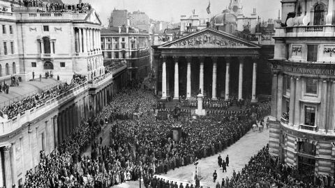 With centuries-old pageantry, Queen Elizabeth II's accession to the throne was proclaimed at four historic London sites on February 8, 1952. The day's ceremonies began with a meeting of the Accession Council, which the Queen attended in St. James' Palace. The proclamation was then read from a balcony of the palace overlooking Friary Court, and again at Charing Cross, Temple Bar, and from the steps of the Royal Exchange, pictured.