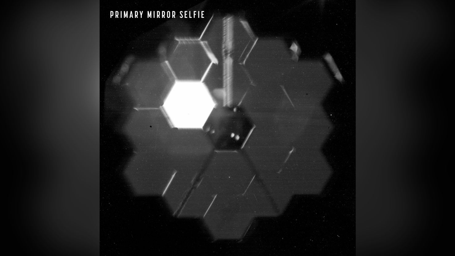 This "selfie" shows the primary mirror of the James Webb Space Telescope as it orbits about a million miles from Earth. 