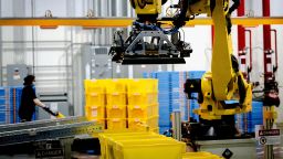 A robot sorts and stacks bins at Amazon fulfillment center in Eastvale, CA, on Tuesday, Aug. 31, 2021.