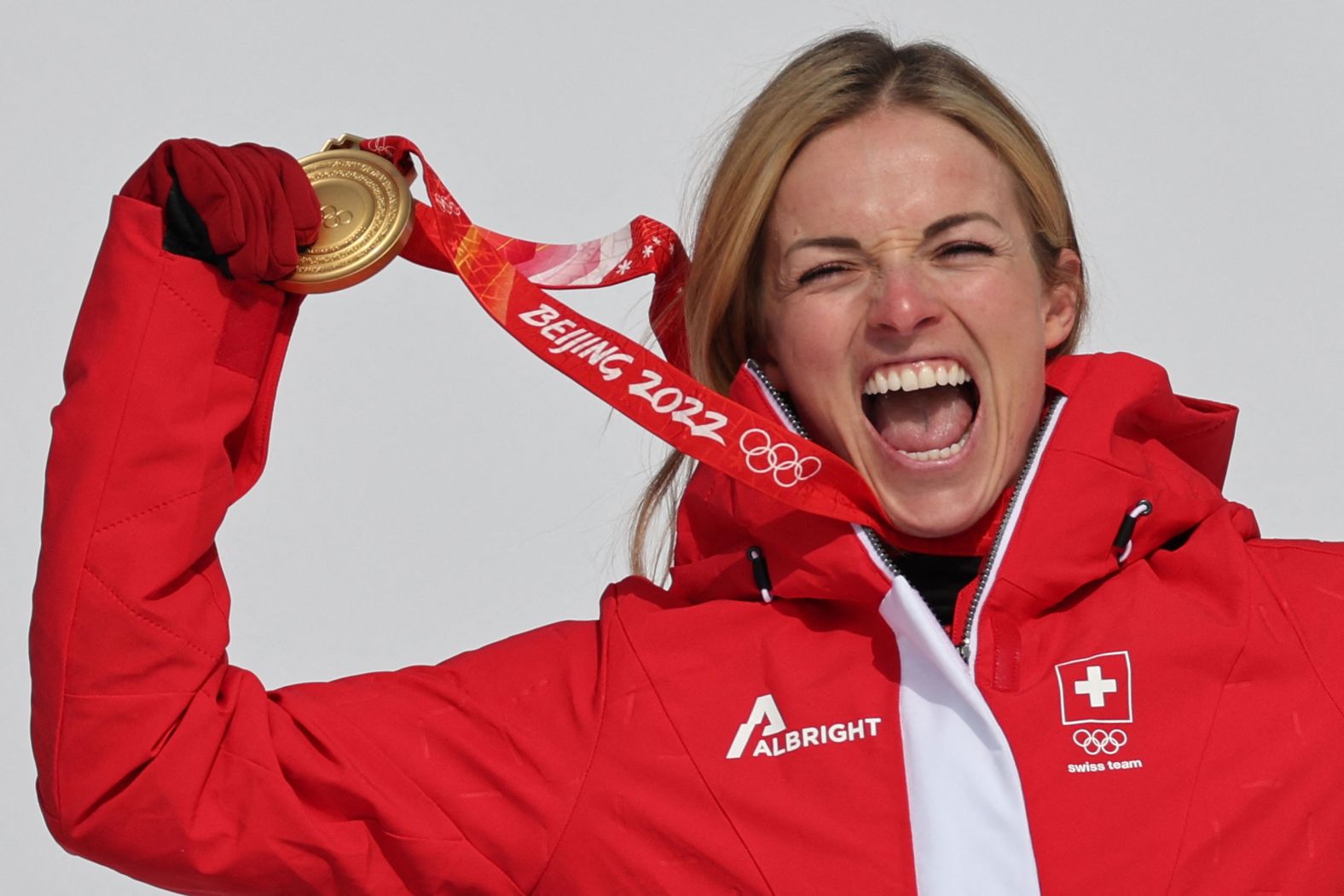 Swiss skier Lara Gut-Behrami celebrates with her gold medal after <a href="index.php?page=&url=https%3A%2F%2Fwww.cnn.com%2Fworld%2Flive-news%2Fbeijing-winter-olympics-02-11-22-spt%2Fh_184f7fab8796a9792844c05daffbd34e" target="_blank">winning the super-G</a> on February 11. It was the third Olympic medal of her career but her first gold.