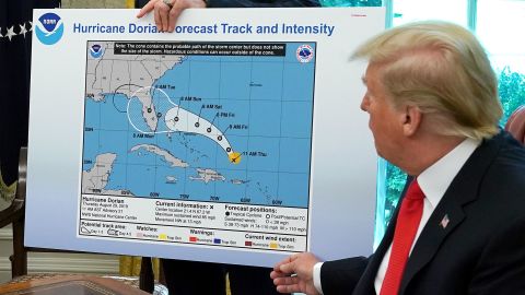 President Donald Trump references a map during a briefing from officials about Hurricane Dorian in the the White House in September 2019. The National Archives said the map was not transfered to them at the end of Trump's presidency.