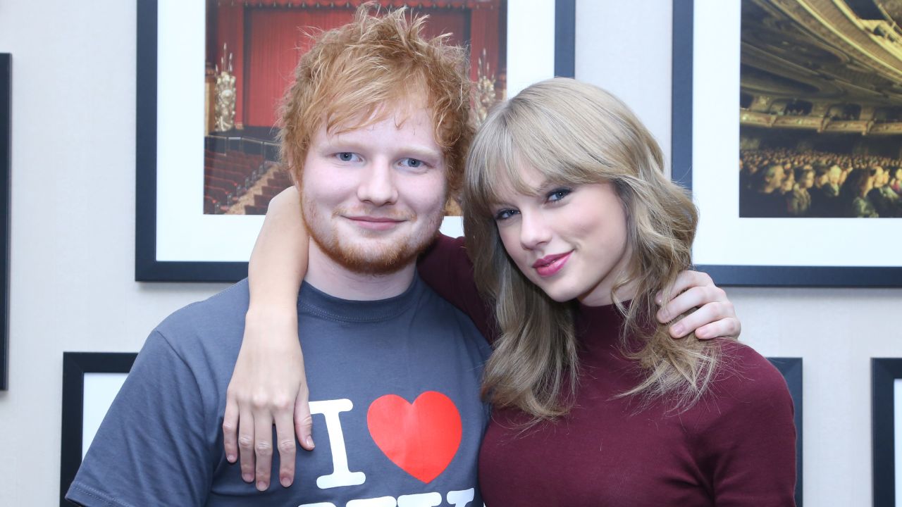 Ed Sheeran poses with Taylor Swift backstage before his sold-out show at Madison Square Garden Arena in New York City on November 1, 2013.