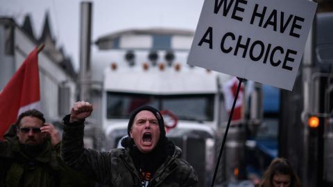 A protester shouts slogans during a protest by truck drivers over pandemic health rules in Ottawa on February 11.
