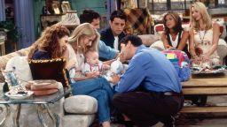 Characters Susan Bunch and Carol Willick appear alongside Ross, Chandler, Joey, Rachel and Phoebe on an episode of "Friends." 