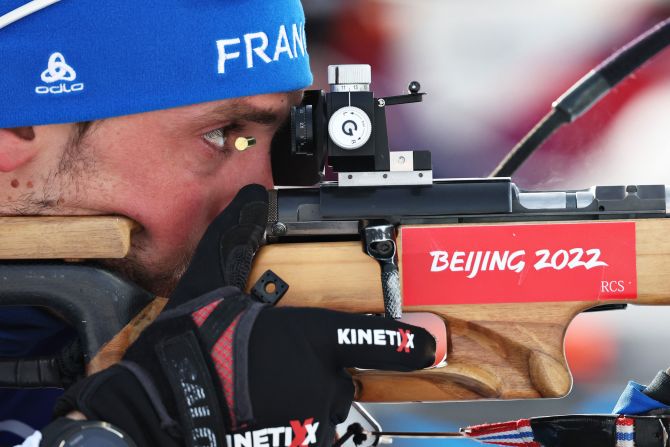 French biathlete Simon Desthieux warms up before the 10-kilometer sprint on February 12.