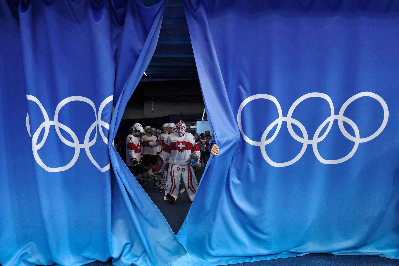 Switzerland's women's hockey team prepares to take the ice before its quarterfinal game on February 12. The Swiss defeated the Russian Olympic Committee team 4-2.