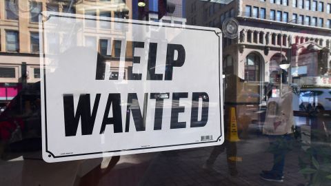 A 'help wanted' sign is posted in front of restaurant on February 4, 2022, in Los Angeles.