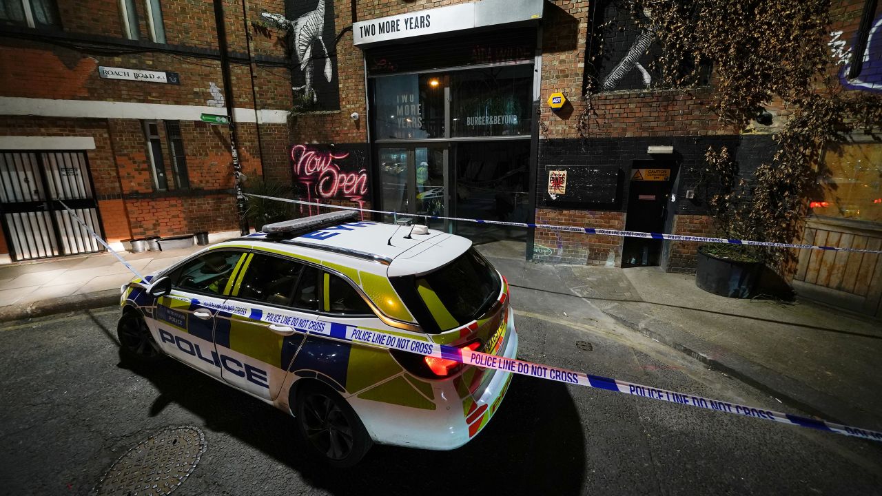 Emergency services outside the Two More Years bar on Saturday.