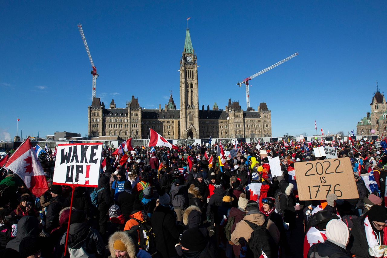 Supporters arrive at Parliament Hill to protest on January 29. Hundreds of truckers drove their giant rigs into the Canadian capital.